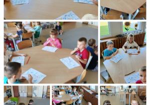 Dzieci rozdmuchują zabarwioną wodę na kartkach papieru.